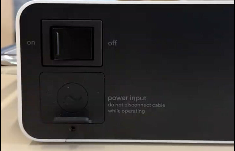 The rear AC power switch on a Pila Mesh Home Battery, turned to the OFF position
