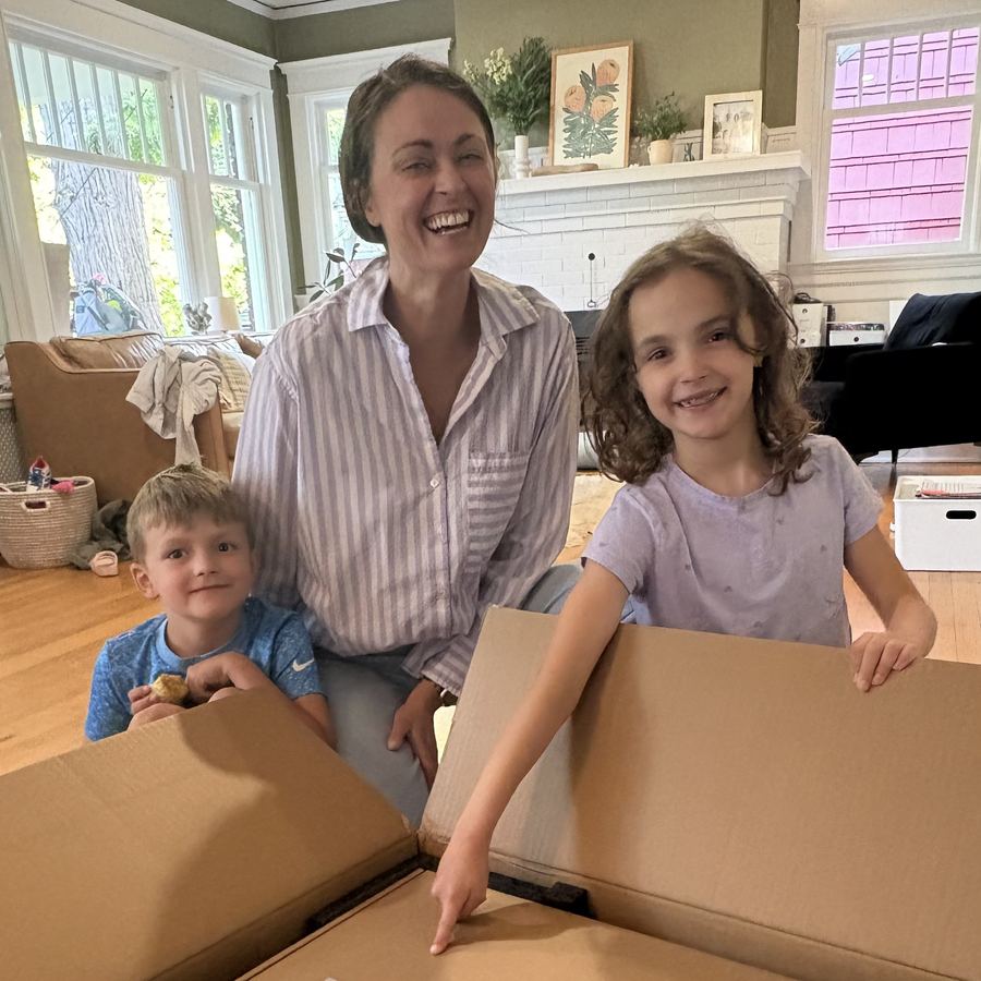 Lisa and her kids unboxing their Pila